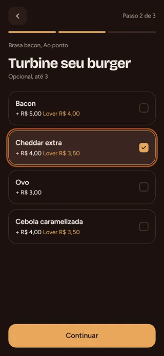 Passo 3: Marque os adicionais que quiser. Cada um mostra quanto soma ao preço. Toque em Continuar.
